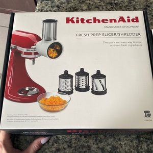 Kitchen Aid slicer/shredder. Brand new never used